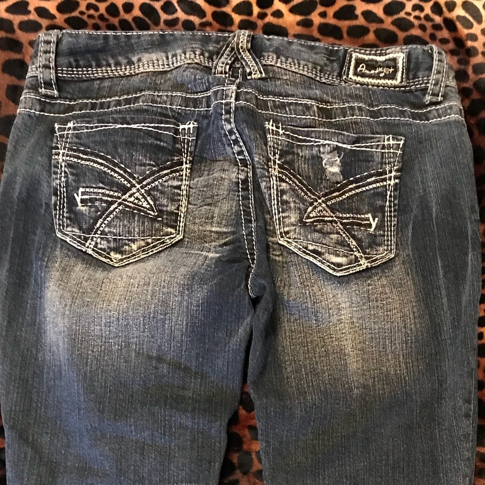 Like New Amethyst Jean Capris